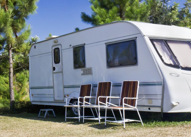 Caravan and deck chairs